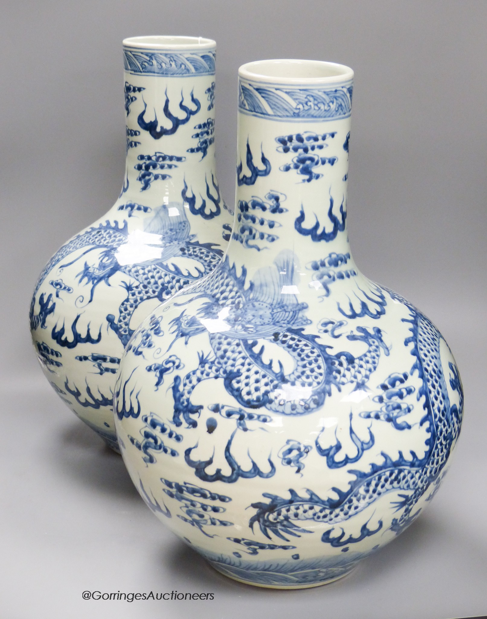 A pair of large Chinese blue and white vases, 45cm high